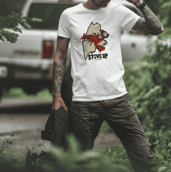 Man wearing lobster shirt in woods